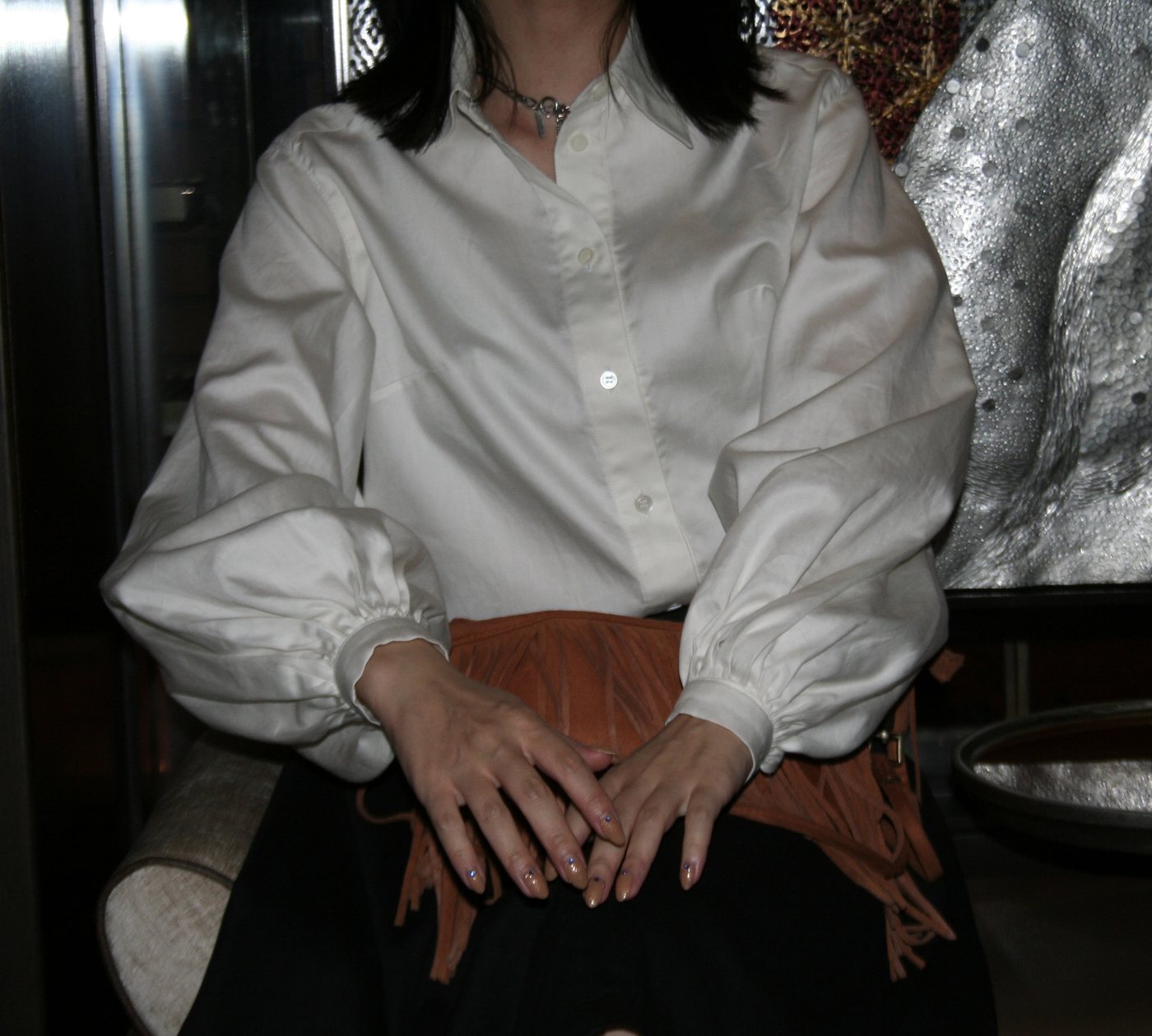 Casual blouse worn, front view with balloon sleeves and band cuff