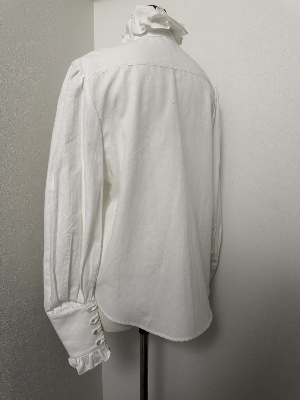Linen shirt blouse, back view on dress form, showing yoke and gathered sleeve head